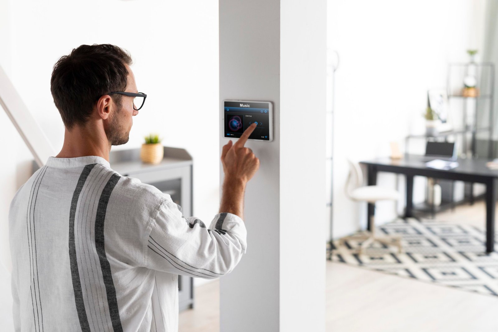 man-using-tablet-his-smart-home